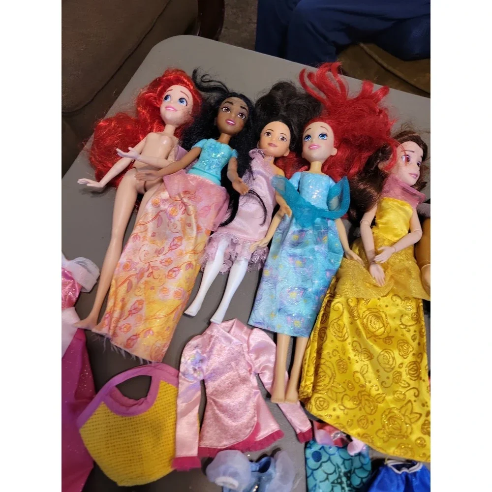 Disney Barbie dolls with extra dresses shoes etc... Mixed lot
